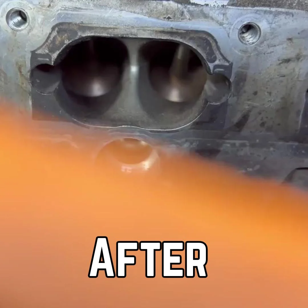 After-cleaning image showing the intake port and two valve surfaces with substantially less visible contamination