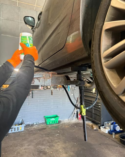 Particulate filter additive being refilled during a DPF additive service at Prestige Performance Group