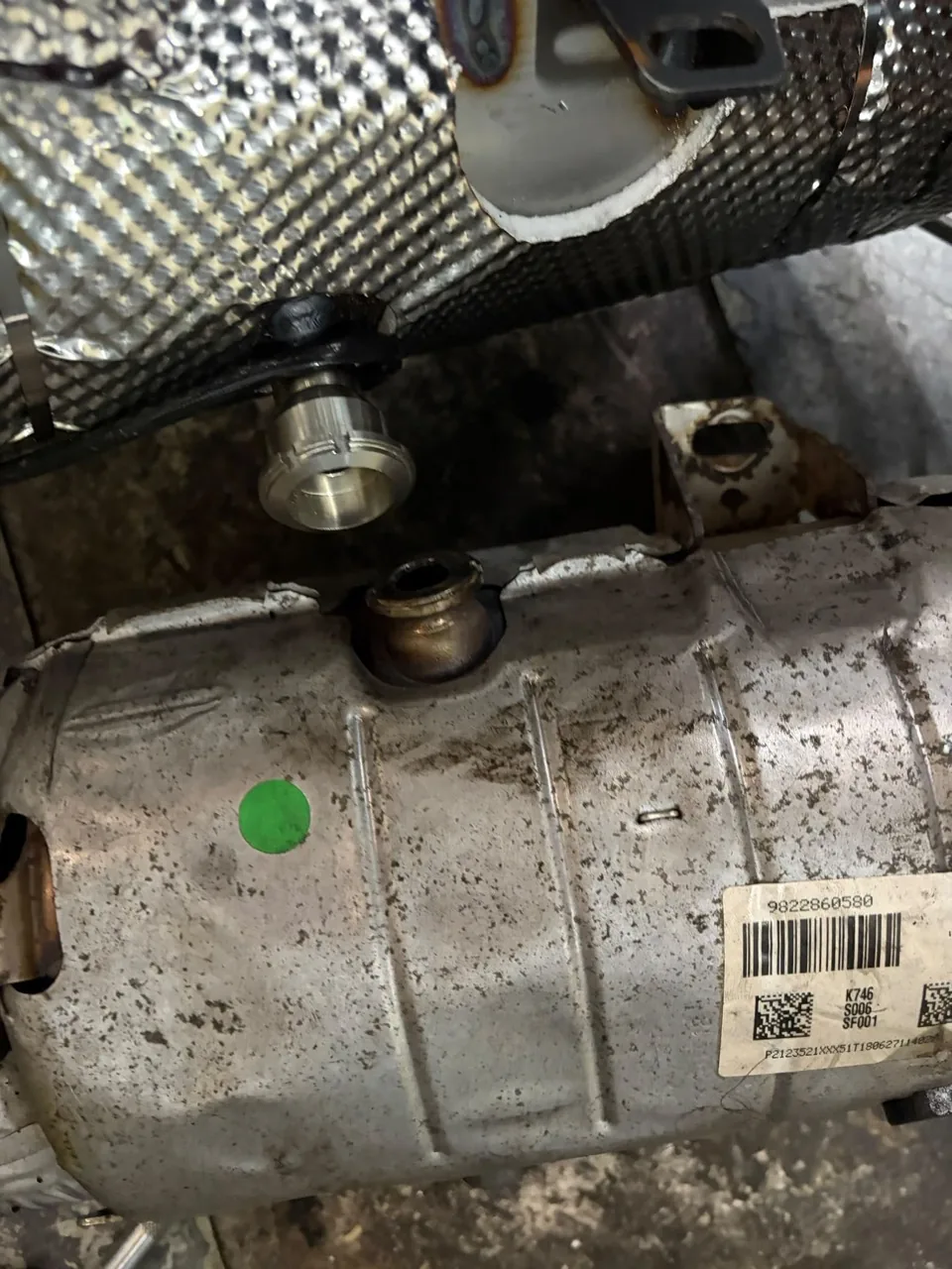 Incorrect AdBlue injector adapter on an aftermarket replacement DPF at PPG NI